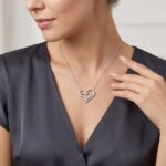 Wit gouden dubbele harten hanger