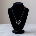 Wit gouden dubbele harten hanger