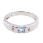 Wit gouden ring met topaas en diamanten