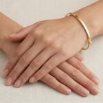 Geel gouden Christian slavenarmband