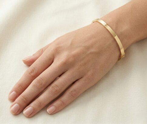 Geel gouden Christian slavenarmband