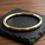 Geel gouden slavenarmband rond model