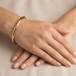 Geel gouden slavenarmband rond model