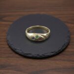 Christian gouden ring met saffier, robijn en smaragd