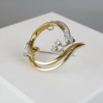 Gouden broche met diamanten