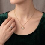 Geel gouden collier met harten hanger
