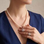 Parelsnoer met gouden slot en diamanten
