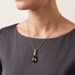 Gouden collier met rookkwarts en diamant
