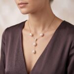 Gouden collier met parels en diamant