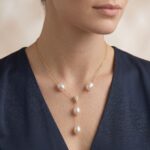 Gouden collier met parels en diamant