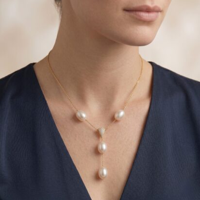 Gouden collier met parels en diamant