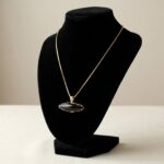 Gouden collier met onyx hanger