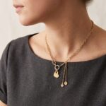 Gouden collier met hangers