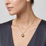 Geel gouden collier met harten hanger