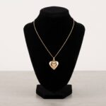 Geel gouden collier met harten hanger