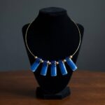 Gouden spang met glazen hangers