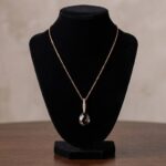 Gouden collier met rookkwarts en diamant