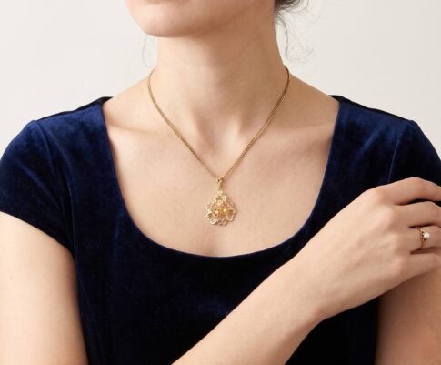 Geel gouden bloem parel collier