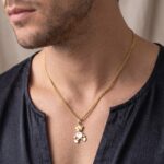 Gouden collier met teddybeer hanger