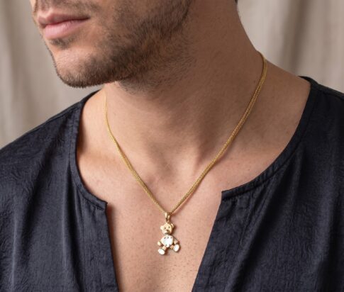 Gouden collier met teddybeer hanger