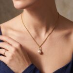 Geel gouden collier met parelhanger