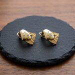 Gouden oorclips met diamant