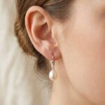 Wit gouden oorbellen met parel
