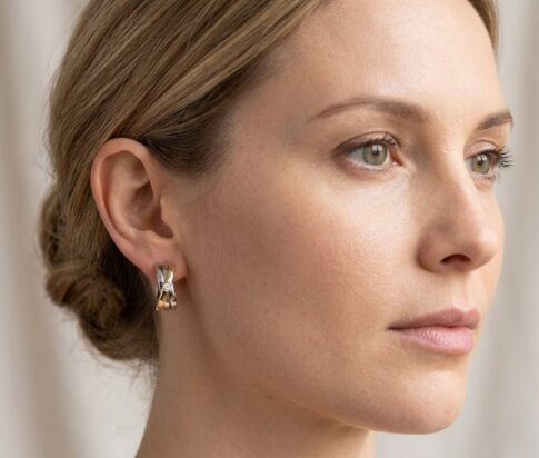 Bicolor gouden oorbellen met diamant