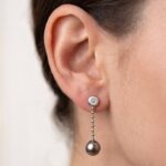 Wit gouden oorbellen met diamant en parel