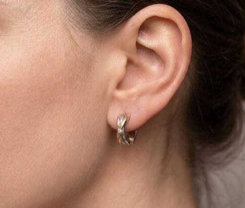 Bicolor gouden oorbellen met diamant