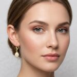 Gouden oorbellen met parel