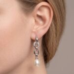 14 karaat wit gouden oorbellen met parel en diamant