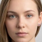 Wit gouden oorbellen met diamanten en amethist