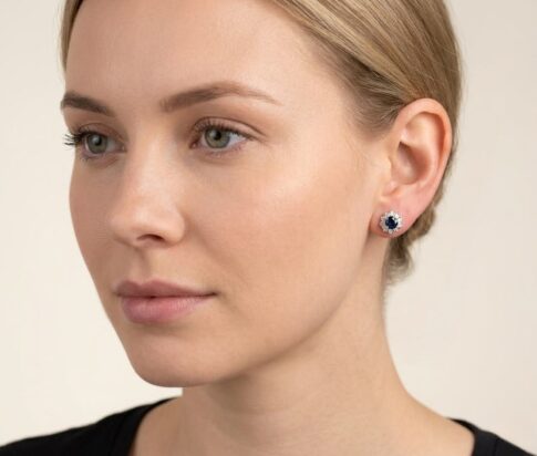 Bicolor gouden oorbellen met saffier en diamant