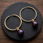 Gouden oorbellen met hangers