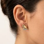 Christian bicolor oorbellen met diamanten