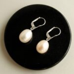 Wit gouden oorbellen met parel