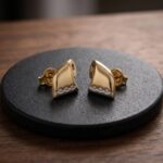 Christian bicolor oorbellen met diamanten