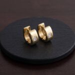 Gouden zirkonia creolen