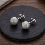 Wit gouden oorknopen spikkels model