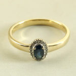 14 karaat gouden ring met saffier en diamanten