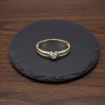 Bicolor gouden ring met 1 diamant