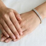 14 karaat geel- en wit gouden armband met zirkonia