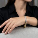 14 karaat geel- en wit gouden armband met zirkonia