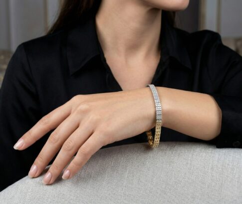 14 karaat geel- en wit gouden armband met zirkonia