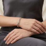 14 karaat geel-, wit en rosé gouden armband met zirkonia