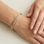 Gouden slavenarmband met zirkonia