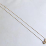 Gouden Infinity collier met zirkonia