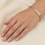 Gouden slavenarmband met zirkonia