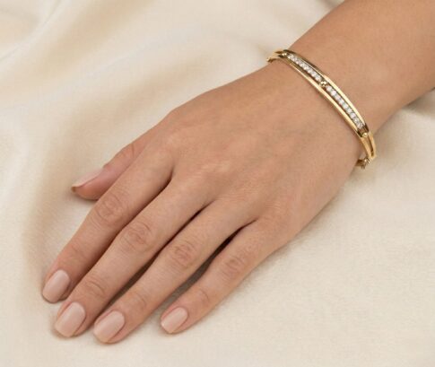 Gouden slavenarmband met zirkonia